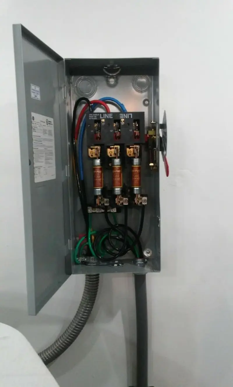 Three-phase disconnect switch installed for Smoke Detector Installation in New Smyrna Beach